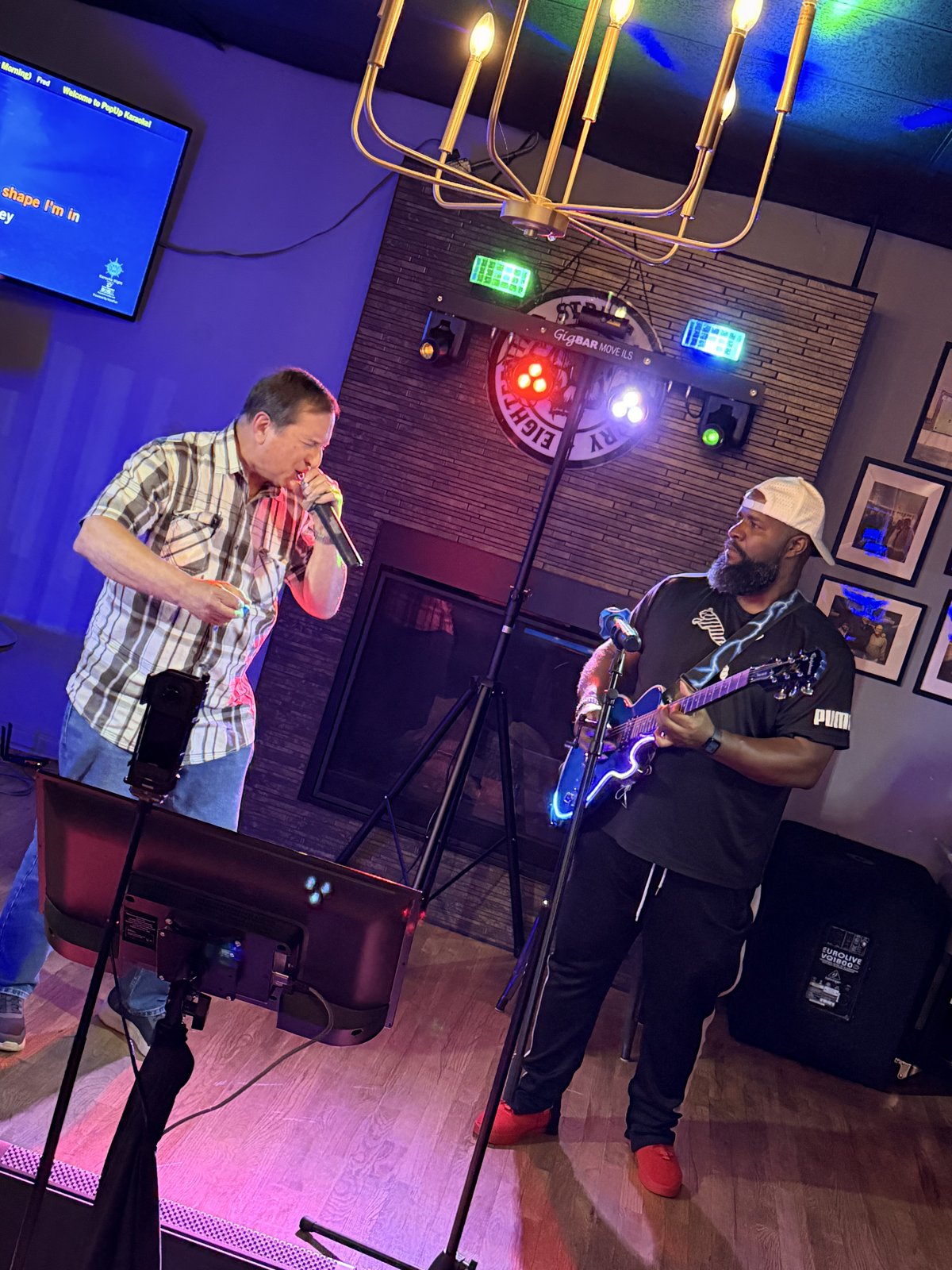 Karaoke singer with guitarist at 18th Street Brewery Gary Indiana showing full venue setup